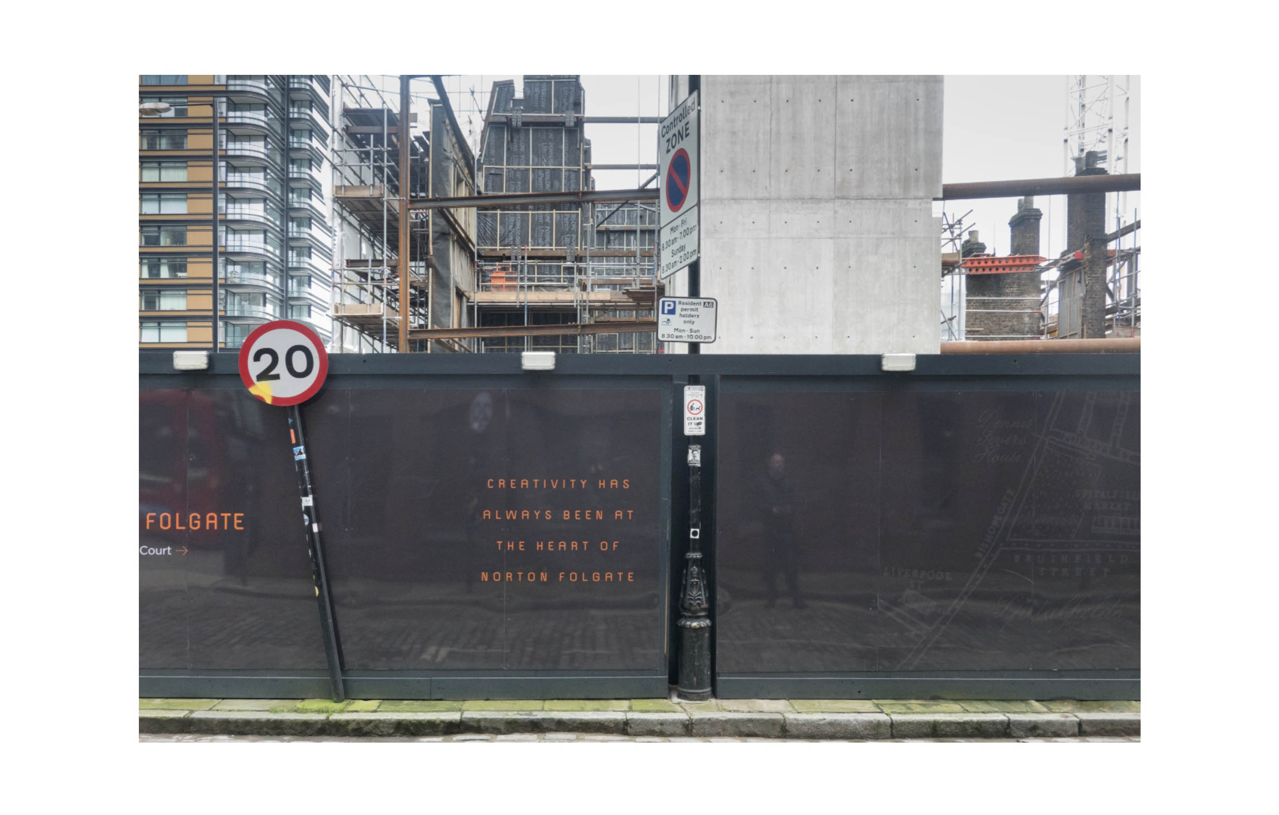 a black hoarding which says Creativity has always been at the heart of Norton Folgate